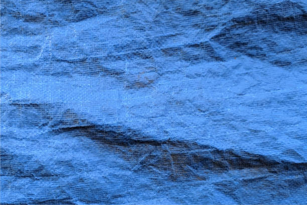 istock Abstract blue background design. Texture of crumpled blue plastic trash bag for background stock illustration 1278283491