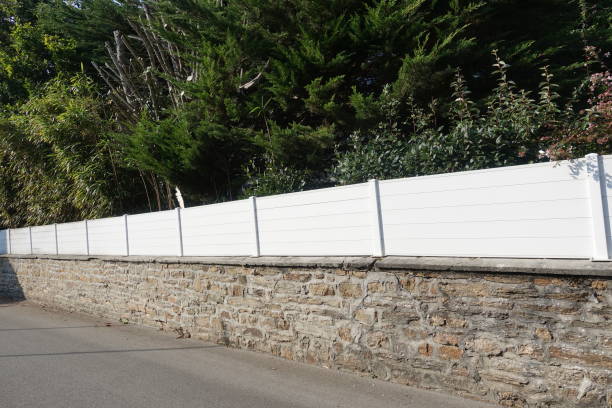 istock Fence  PVC panel on stone wall  Enclosed garden 1278284346
