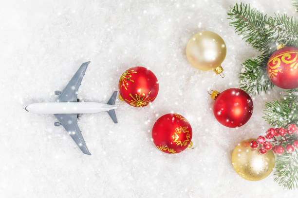 istock Travel for Christmas. Airplane with Christmas decor. Selective focus. 1278286948