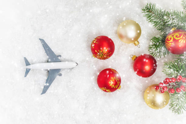 istock Travel for Christmas. Airplane with Christmas decor. Selective focus. 1278286949