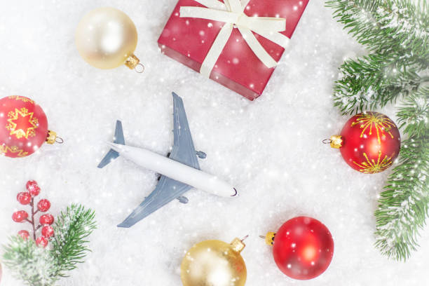 istock Travel for Christmas. Airplane with Christmas decor. Selective focus. 1278286950