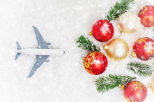 istock Travel for Christmas. Airplane with Christmas decor. Selective focus. 1278286974