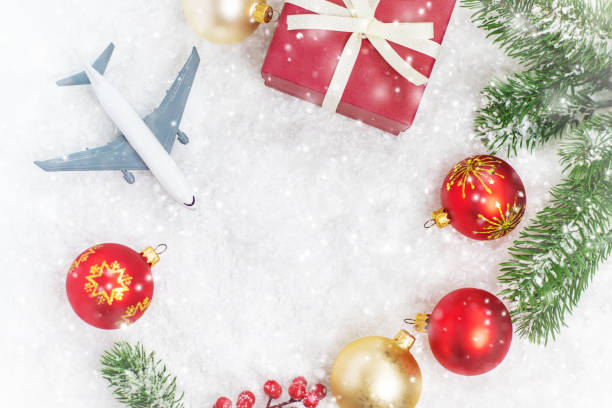 istock Travel for Christmas. Airplane with Christmas decor. Selective focus. 1278286996