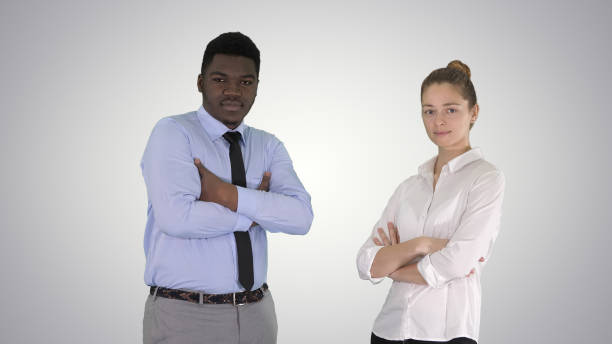 istock International business people standing with folded arms on gradi 1278288004