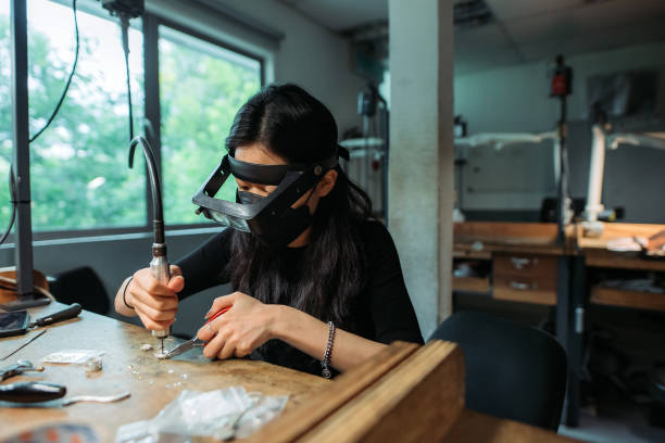 istock Asian korean female student making jewelry at college workbench 1278288436
