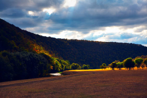istock Valley surrounded by spectacular hills 1278289627