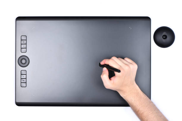 istock Hand of the designer with pen 1278290011