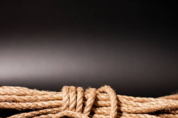 istock Jute rope on a dark or black background. 1278295490