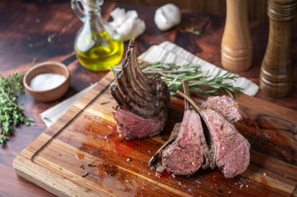 istock roasted lamb rack on wooden cutting board 1278295725
