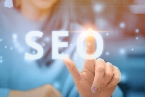 istock search engine optimization concept with the girl touches the Digital Display 1278297148