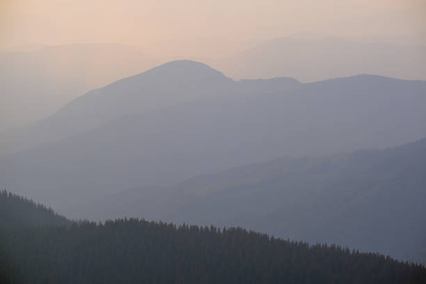 istock Summer misty evening mountain tops 1278297378
