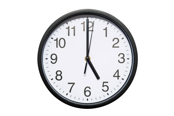 istock Wall clock shows time 5 o'clock on white isolated background. Round wall clock - front view. Seventeen o'clock 1278297493