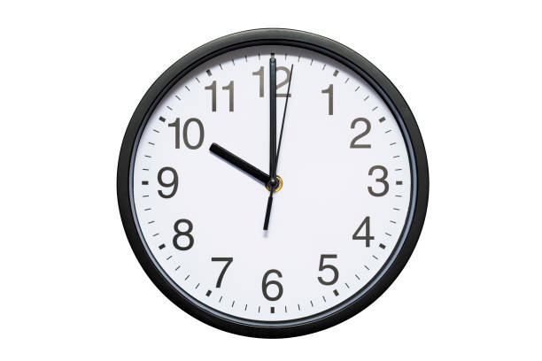 istock Wall clock shows time 10 o'clock on white isolated background. Round wall clock - front view. Twenty two o'clock 1278297498