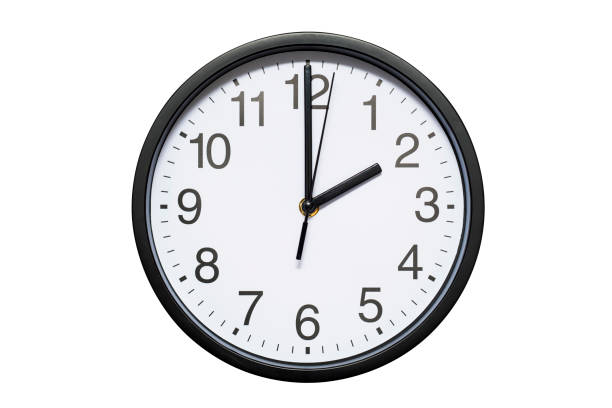 istock Wall clock shows time 2 o'clock on white isolated background. Round wall clock - front view. Fourteen o'clock 1278298015