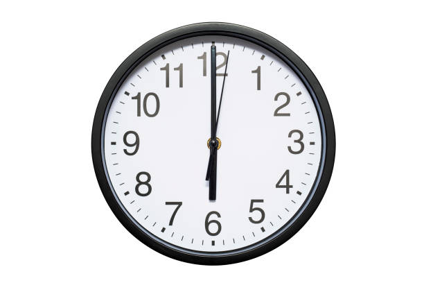 istock Wall clock shows time 6 o'clock on white isolated background. Round wall clock - front view. Eighteen o'clock 1278298016