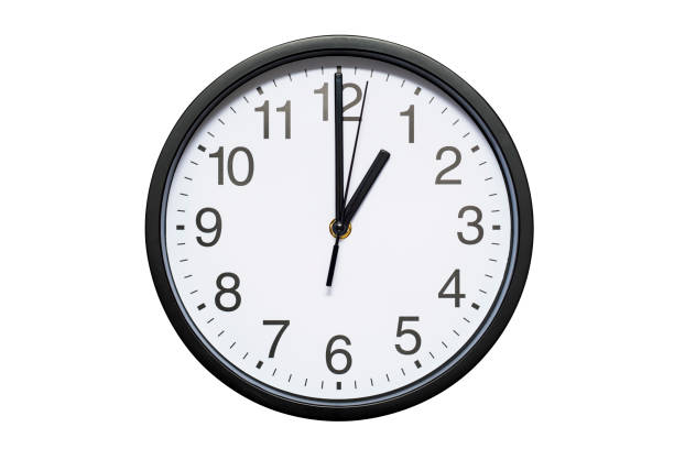 istock Wall clock shows time 1 o'clock on white isolated background. Round wall clock - front view. Thirteen o'clock 1278298081