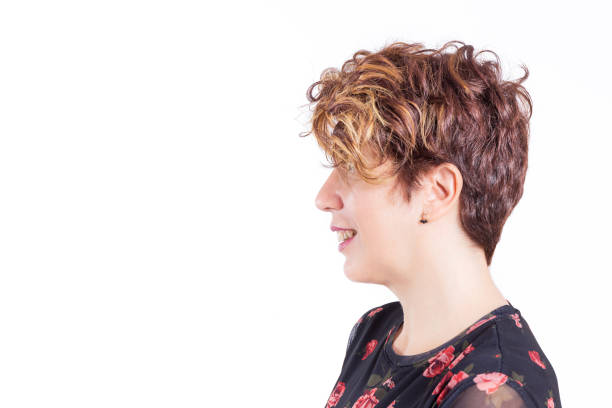 Short hair woman in profile on white background