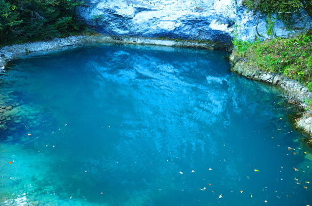 Blue lake among the rocks in Abkhazia