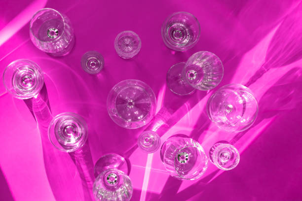 Different elegant glasses and flecks with shades on purple