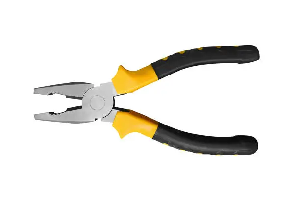 Photo of Pliers yellow and black color on white background. Pliers isolated on white