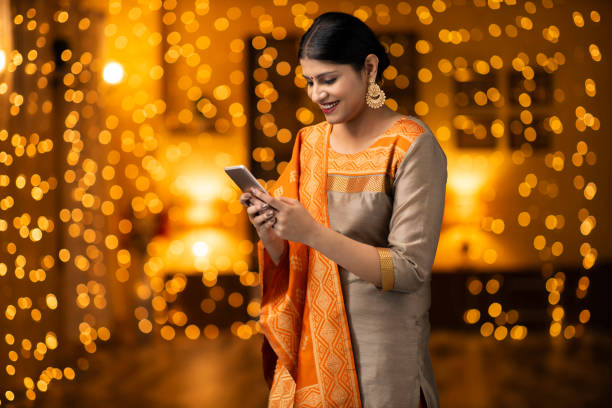 istock young women celebrate diwali 1278307547