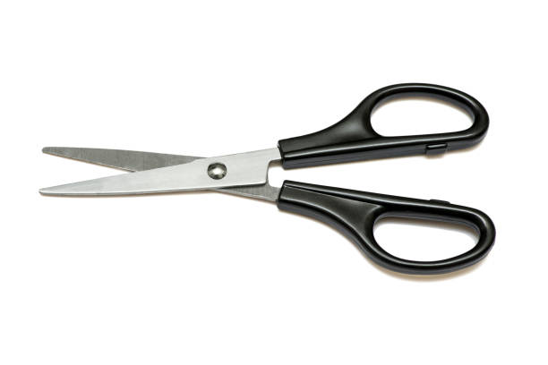 istock Scissors hand-operated cutting instruments. Scissors for cutting paper and thin materials. Scissors isolated on white background 1278308896