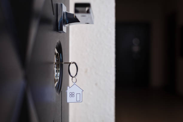 istock A key in a lock with house icon on it 1278312955