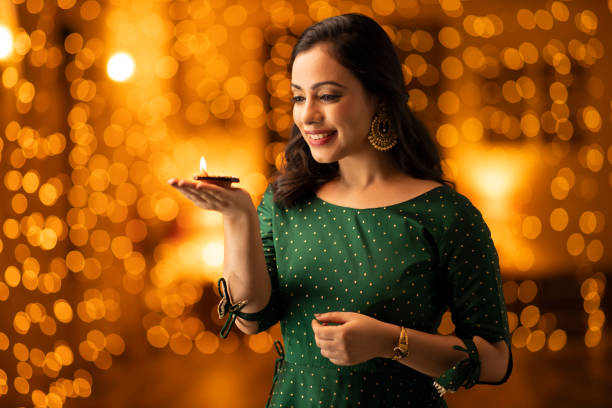 young woman diwali celebrate - stock photo Indian, Indian culture, festival, ethnicity, woman, adult, Diwali, diwali stock pictures, royalty-free photos & images