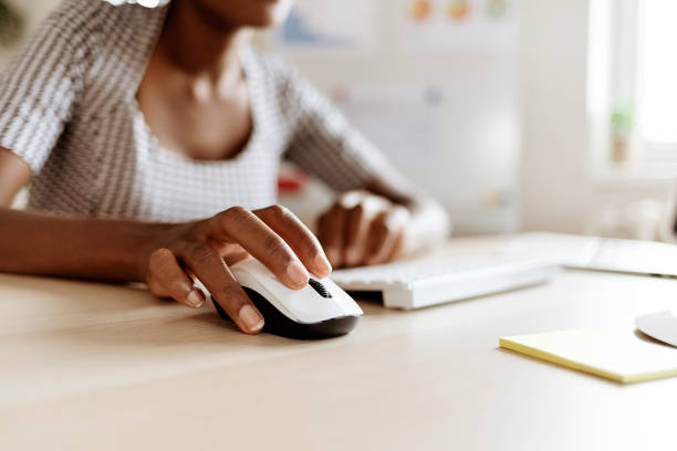 istock Close Up of a Business Woman using Computer Mouse 1278319057