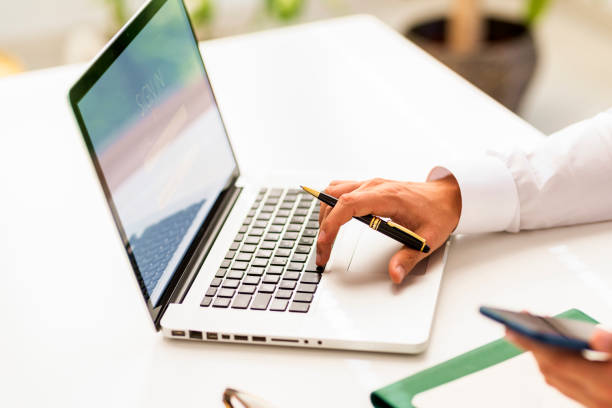 istock Shot of man using laptop and mobile phone while banking online 1278320164