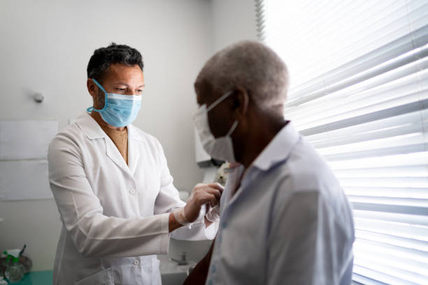 istock Nurse applying vaccine on patient's arm 1278325709