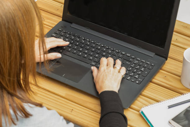 istock Woman typing on laptop 1278325731