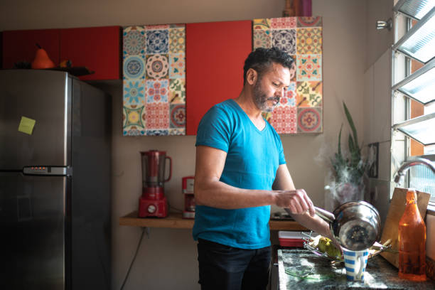 Man preparing coffee at home