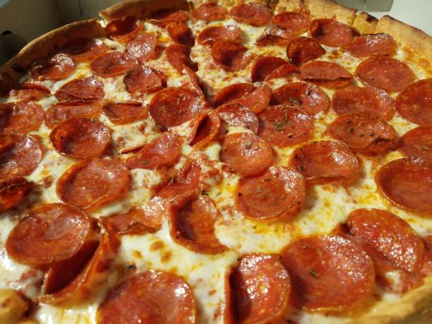 istock pepperoni pizza in cardboard box with grease 1278337058