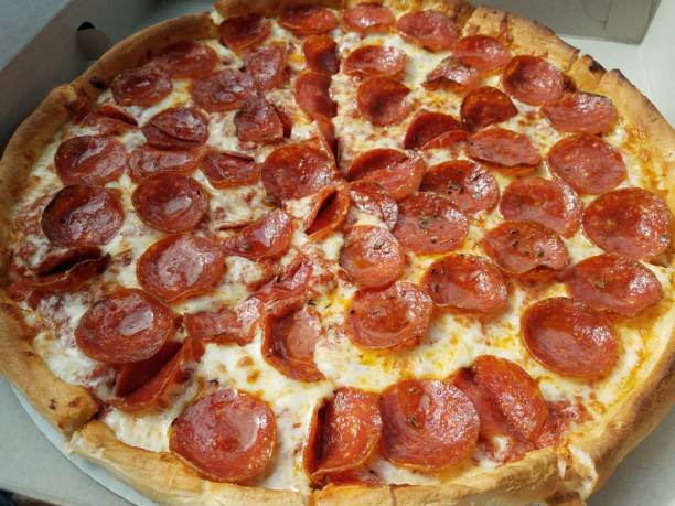 istock pepperoni pizza in cardboard box with grease 1278337060