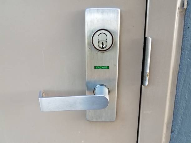 istock bathroom door handle with green vacant sign 1278337080