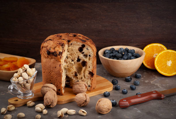 istock panettone on a kitchen board and side dishes arranged at random, selective focus and copy space 1278337118