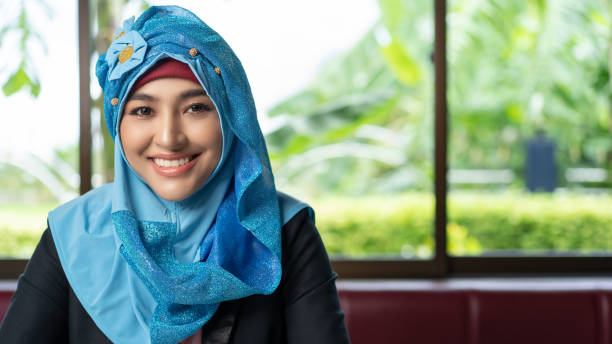 istock Happy Arab woman smiling and looking camera 1278352241
