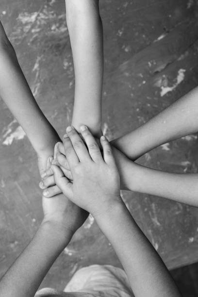 istock children hand together in a circle 1278356959