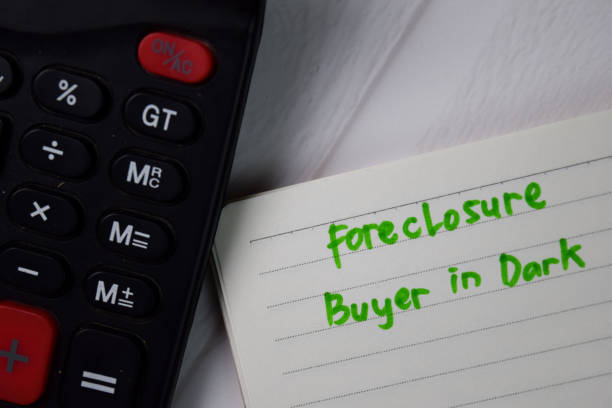 istock Foreclosure Buyer in Dark text write on a book isolated wooden table. 1278365991