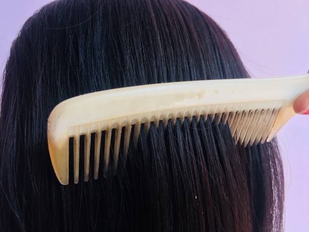 Women combing her hair