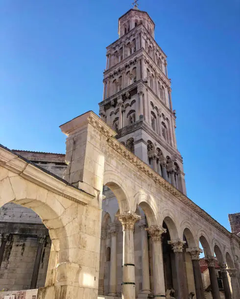 In the heart of Diocletian’s Palace, the Medieval bell tower and Roman Peristil (UNESCO’s World Heritage)