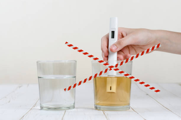 istock Two glasses with clean and dirty water are on the table. 1278370491