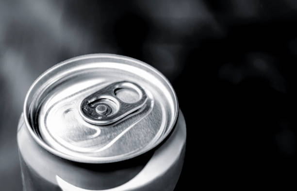 istock Closeup aluminium cans, focus on pull tab open of canned of soft drink. selective focus 1278372827
