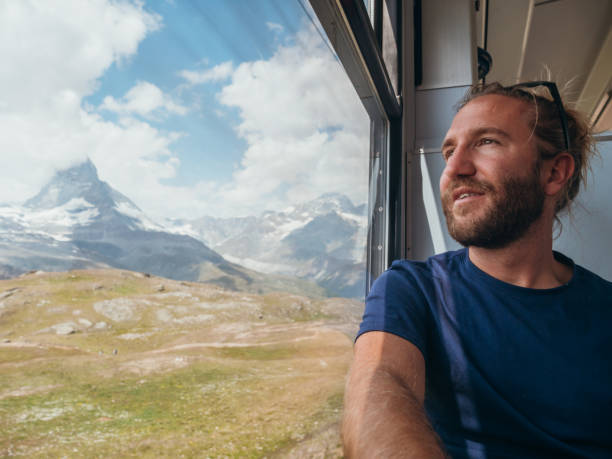 istock Man on train in Zermatt, Switzerland 1278373756