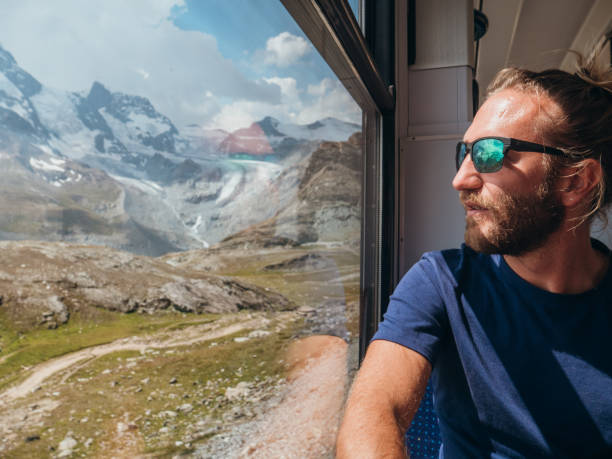 istock Man on train in Zermatt, Switzerland 1278373850