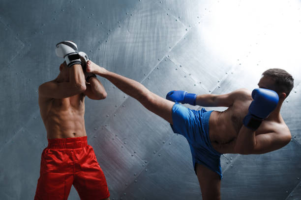 istock Two men boxers fighting muay thai boxing 1278379144