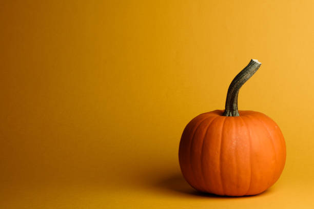 istock Halloween pumpkin on orange 1278379407