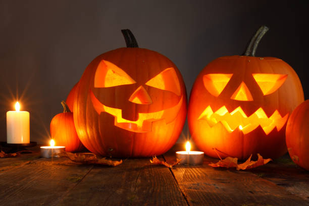 istock Halloween pumpkins and candles 1278379409