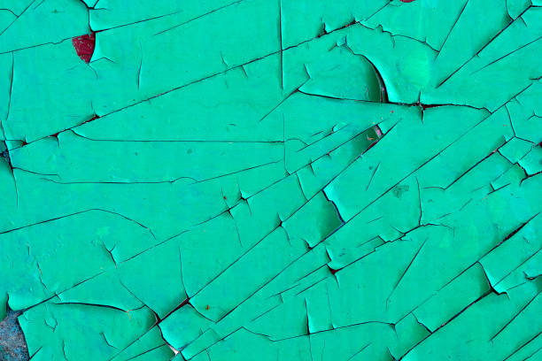 istock Texture of old green paint peeling off the surface 1278379503